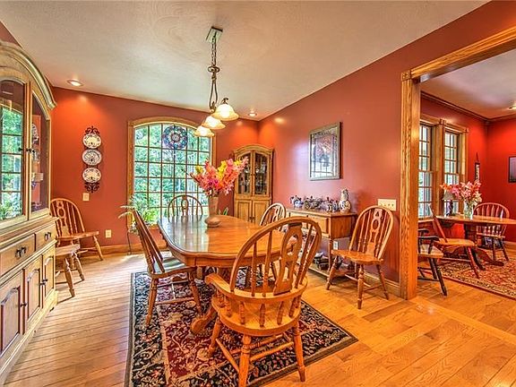 16x12 Formal Dining Room with gleaming hardwood floors and easy access to the kitchen.