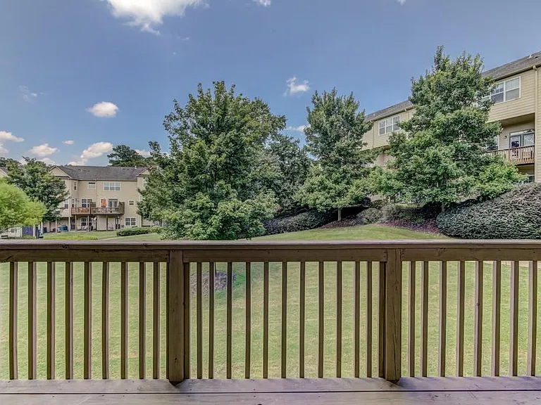 Beautiful View onto Green Space visible from Main Level Balcony