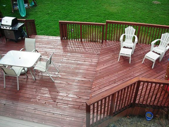Expansive two level wood deck makes entertaining out back a breeze.