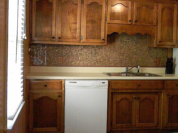 Closer view of the glass tile back splash 