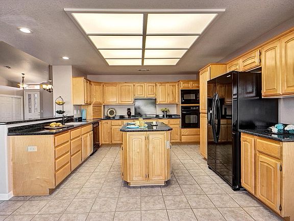 4th image of 11348 E Medina Ave