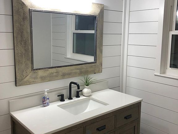 Full Bath located near living room.