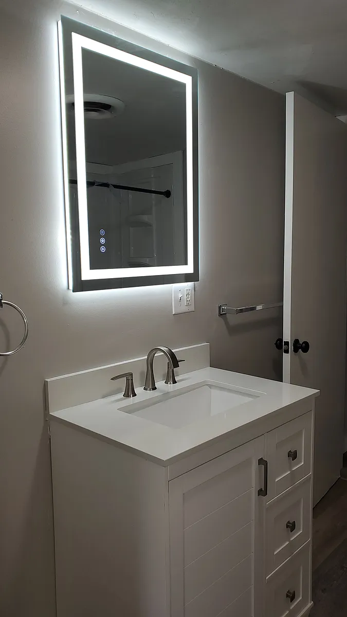 Bathroom with edge lit mirror, new vanity with quartz top - 7763 US Highway 20 #2
