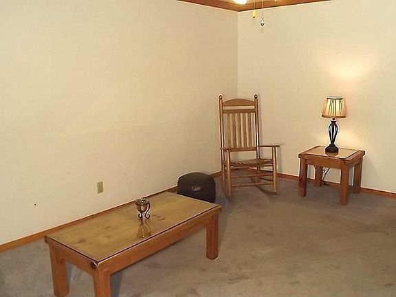 Living room is one of two family rooms.