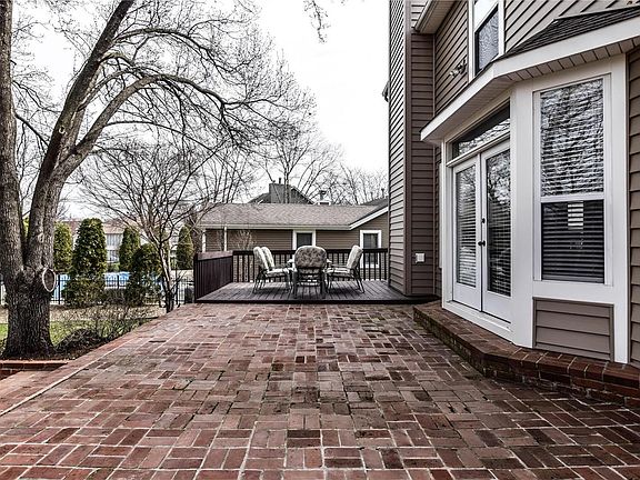 Fabulous paver patio off the kitchen, breakfast and great room area for extra outdoor living space