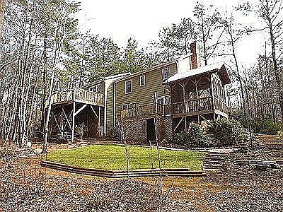 Winter view of 1.22 acres of wooded land with 2 creeks
