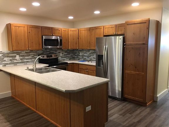 Large kitchen with excellent storage and stainless appliances.