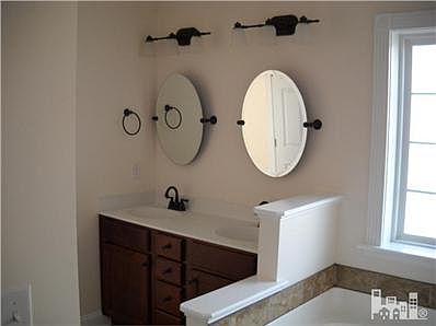 MASTER BATH WITH DUAL SINKS AND LARGE GARDEN TUB AND SEPARATE SHOWER