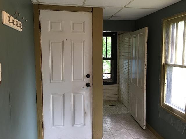 Looking from the mudroom toward the exterior door on the left. The other door is into a small closet.