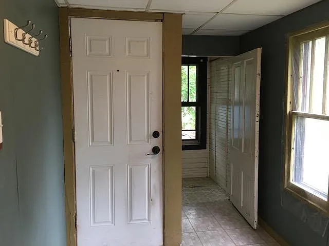 Looking from the mudroom toward the exterior door on the left. The other door is into a small closet.