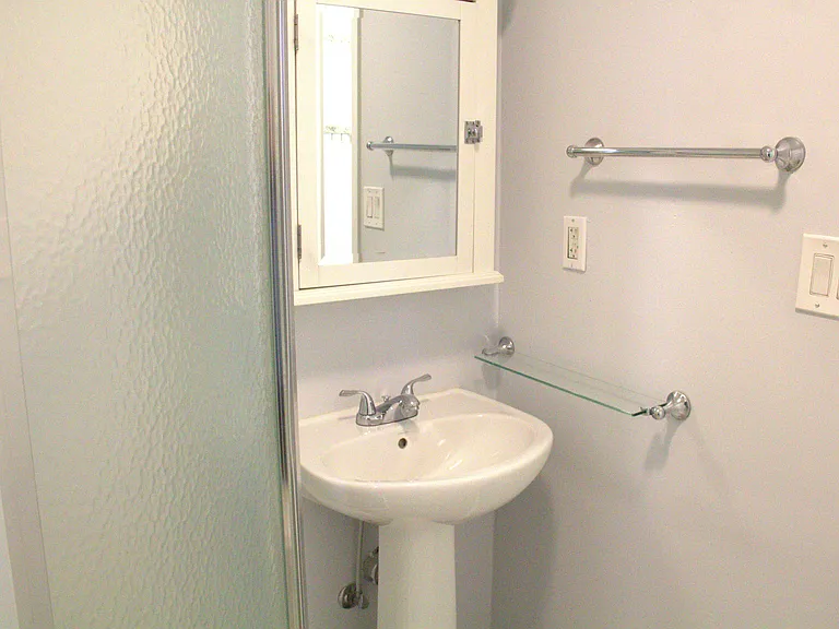 Primary sink and medicine cabinet