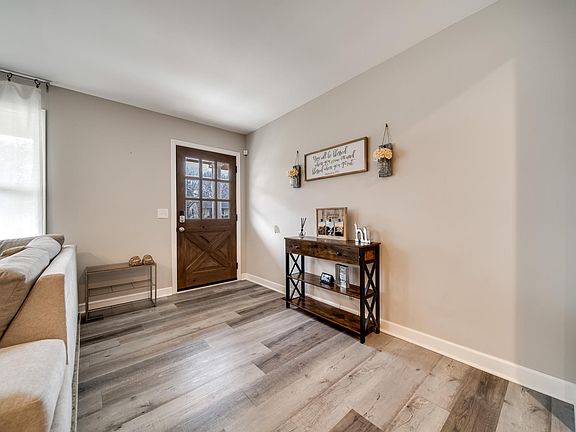 Very welcoming entrance into the home leading to the living room and kitchen.