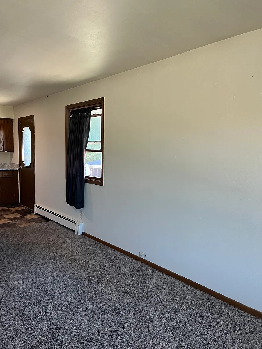 Living room to kitchen - 3255 Main Ave #4