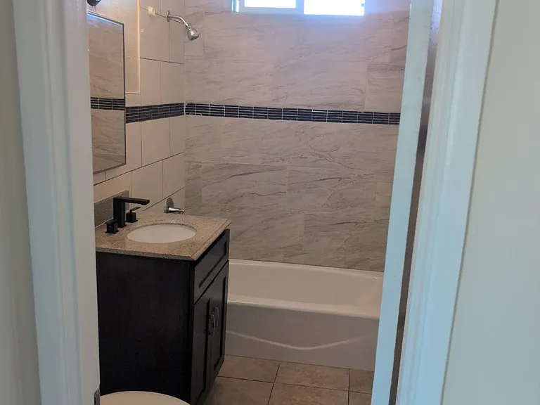 6040 Gotham St #1/2 — Photo 5