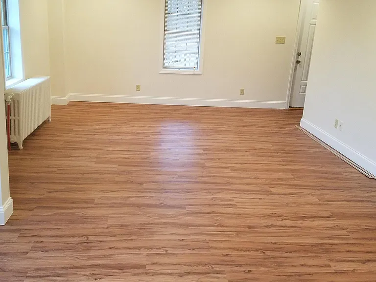 Open concept family room looking from the kitchen.