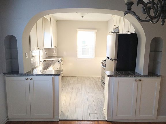 From the dining to kitchen. Extra storage below.