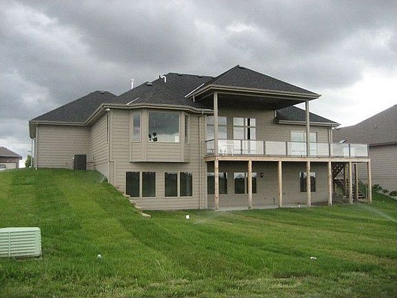 View from rear of home on stormy day (before landscaping)