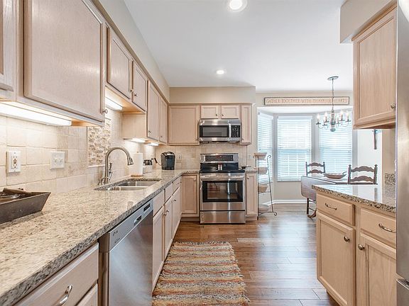 5th image of 6810 Sandharbor Ct