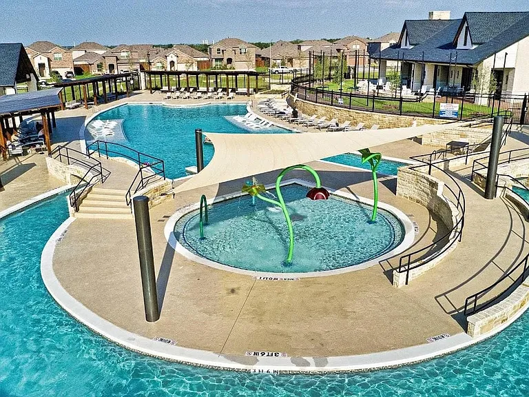 View of swimming pool with a patio