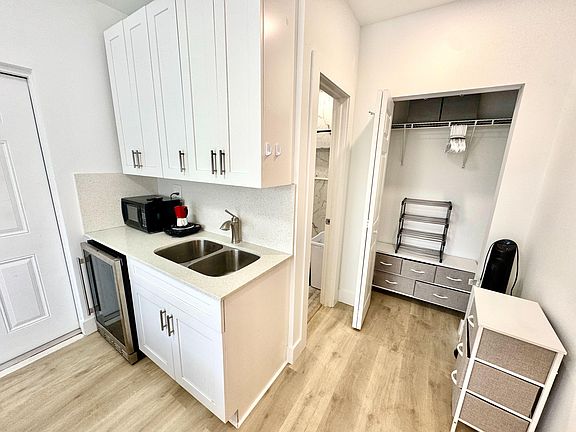 Mini Fridge, Full Size Sink, Cabinets, Burner
