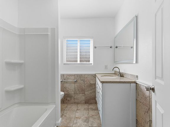 Bathroom with new lit up mirror