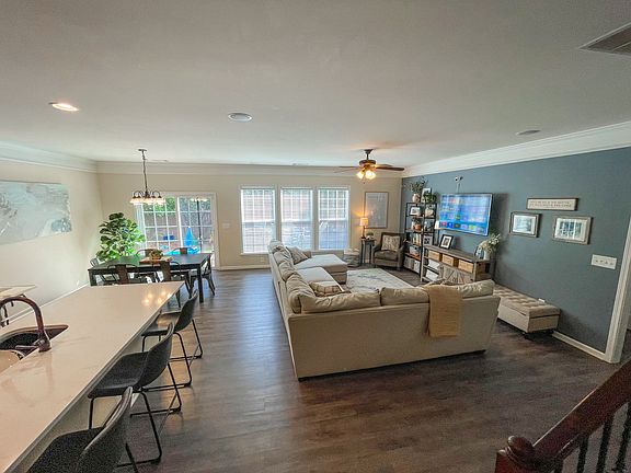 Open-concept living room, dining room, and kitchen