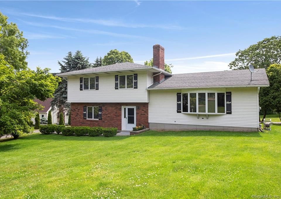 This handsome home sits well back from the road.