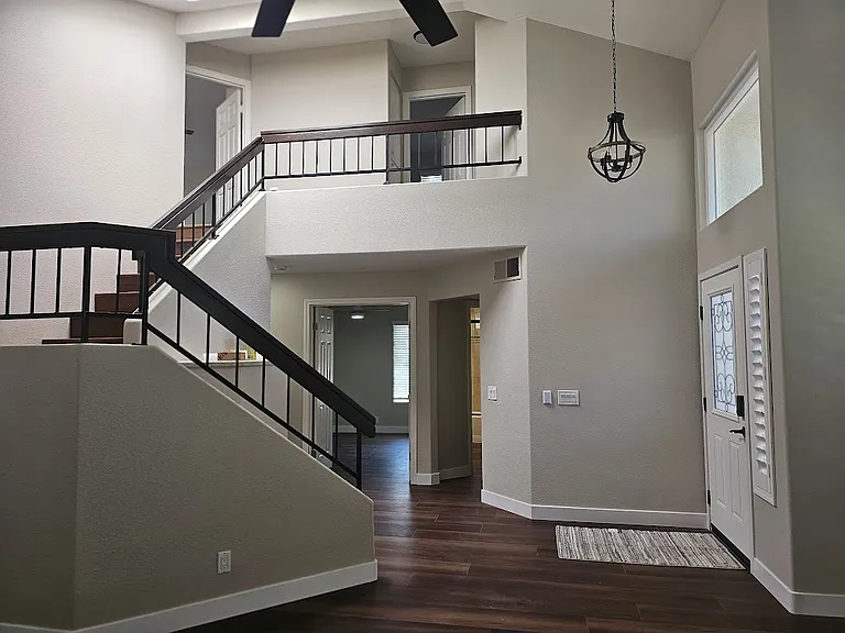 Beautiful 20-foot ceilings in the front room. Double-door entrance to office/bedroom and attached bathroom.