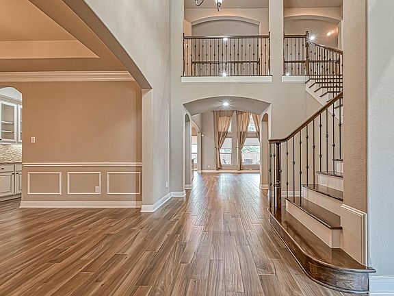 Upon entering the home you will find lots of open space, toll ceilings, one the left - dining area.