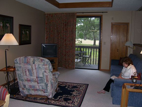 Park-like backyard w/ private porch