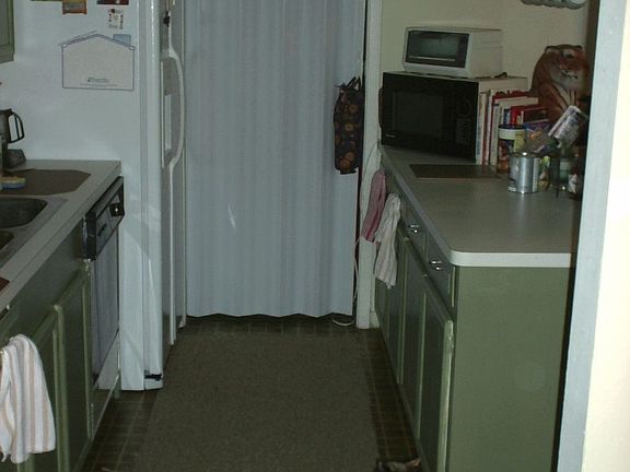 Kitchen-Door goes to laundry nook, then door outside