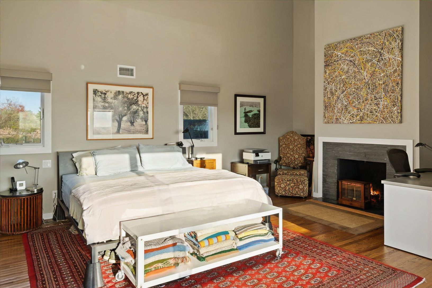  Primary bedroom with fireplace, walk in closet and vaulted ceiling. Grand south facing windows.