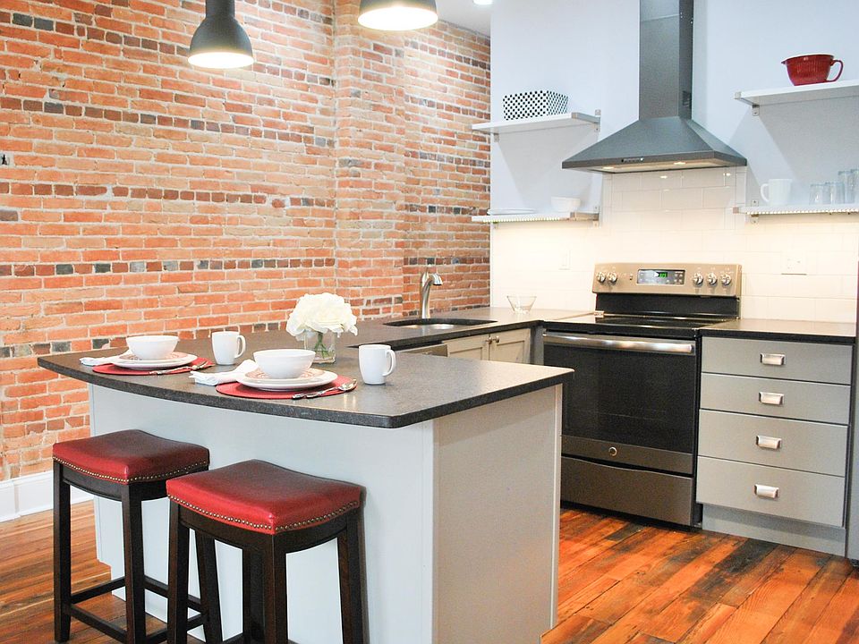 Kitchen includes range, dishwasher, refrigerator and microwave. 
(Personal items are not included.)