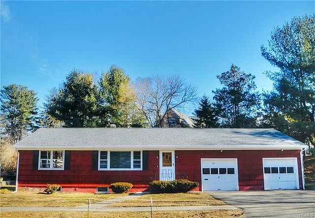 Welcome to 18 Penfield, a sunny village ranch with new roof and two car garage.