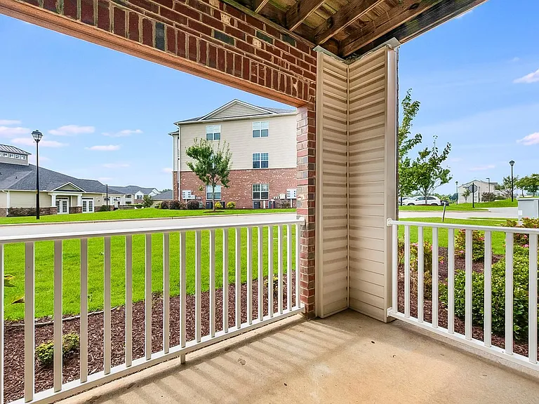 Two Bedroom Patio at Alcove Garner Apartments