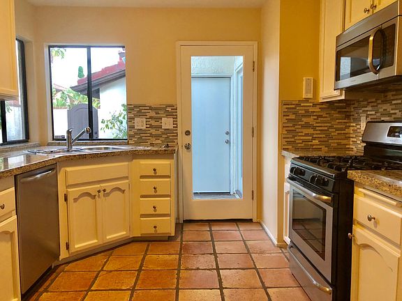 Gas stove and built in microwave.