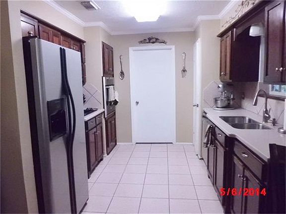 Updated kitchen. Solid surface counter tops. Under mount sink. Updated appliances!