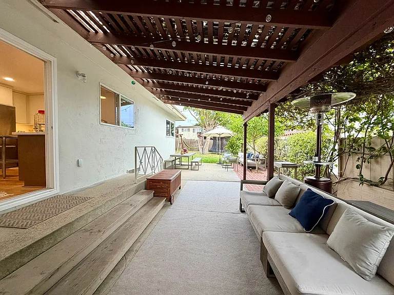 covered side patio off kitchen, wired for outdoor TV
