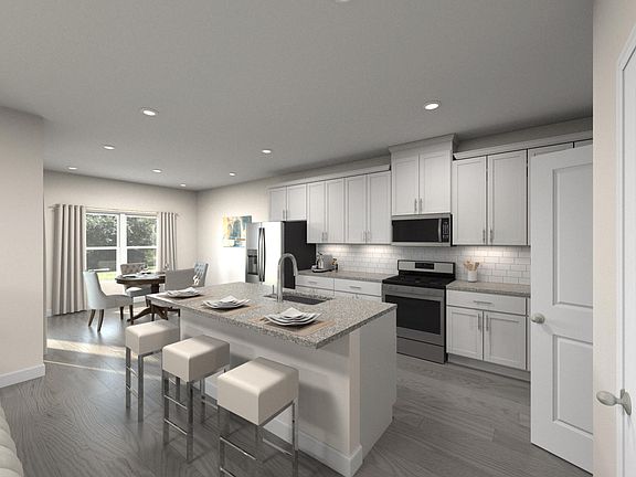 Prepare your favorite meals or catch up with friends around the large kitchen island.