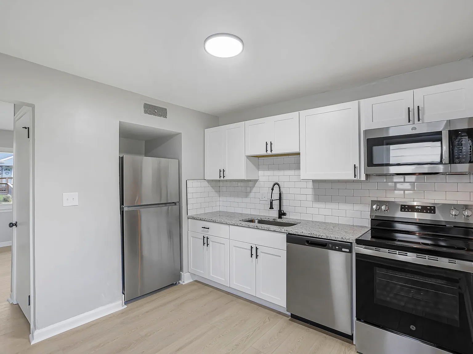 1259 E 16th Ave — Photo 2
