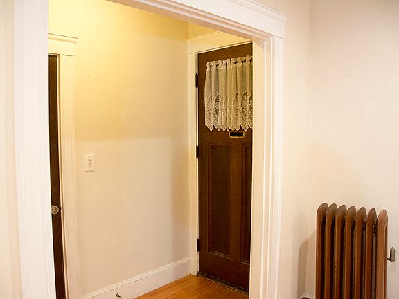 Entry hall and living room front door corner (A & D sides)