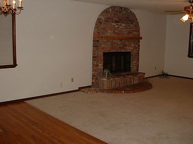 living room with wood fireplace