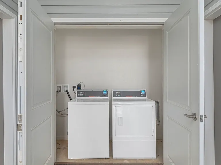 On-site shared laundry facility offering convenient access for residents.