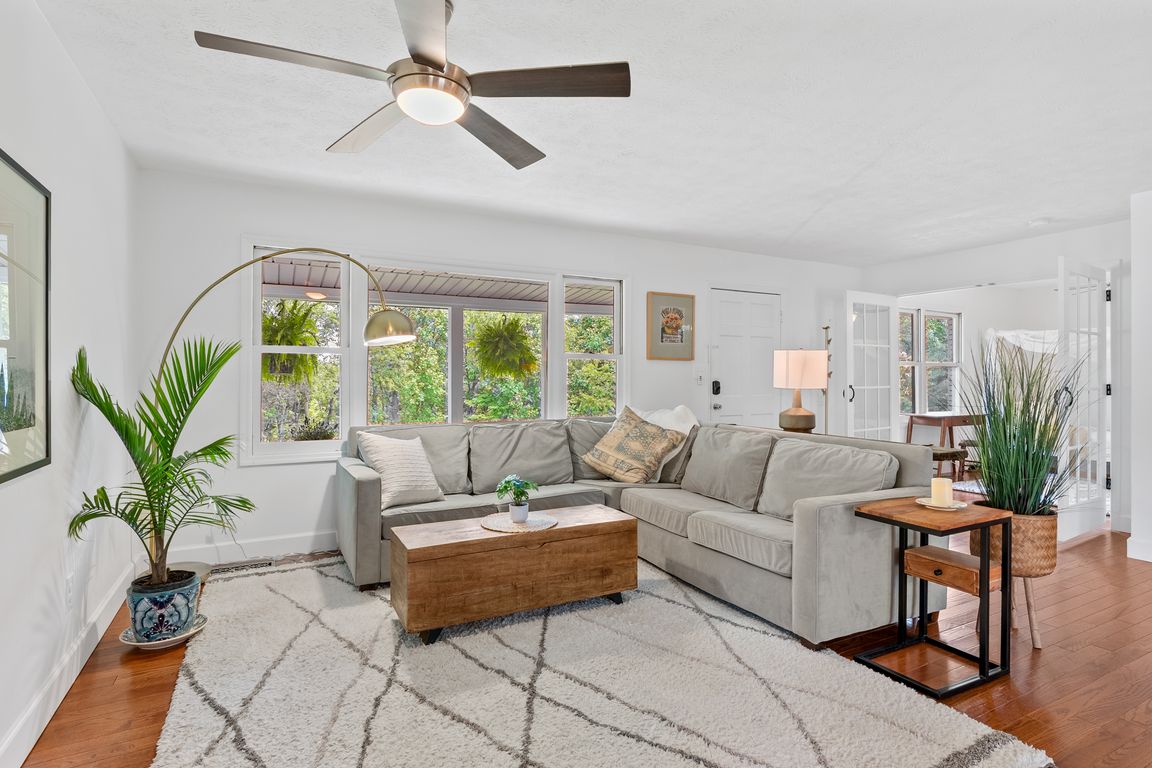 French doors open to third bedroom to living room