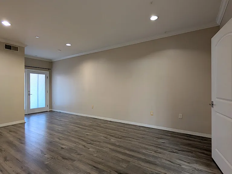 Another view of primary bedroom