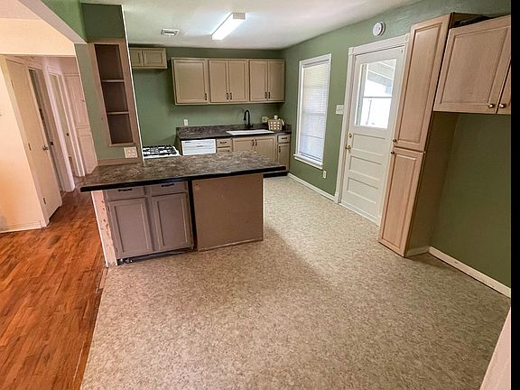 Looking at the kitchen from the dining area.