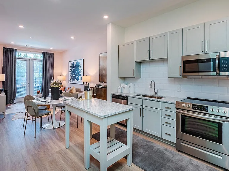 Homes feature luxury vinyl plank flooring and expansive layouts