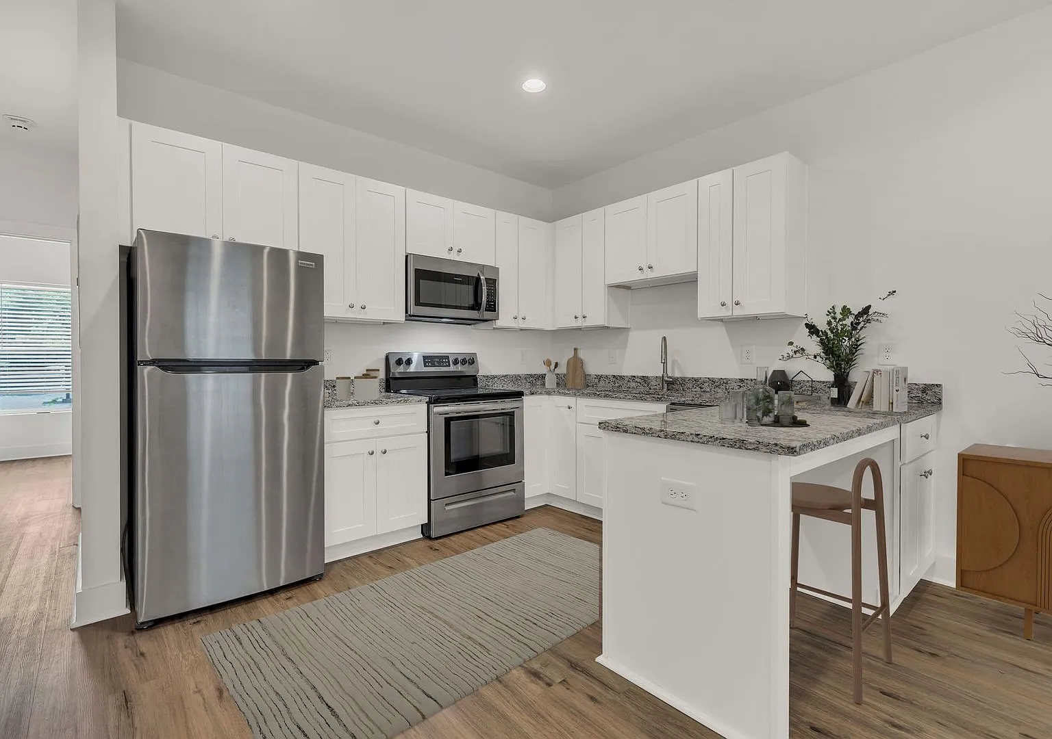 Simple living? We got you. $1200/mo water and laundry included in this 1 BR condo. — Photo 3