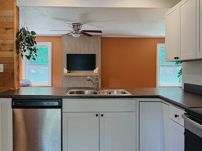 Updated kitchen opens into the living room