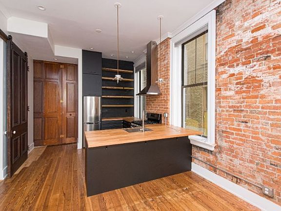 5th image of 309 E 13th St APT 1